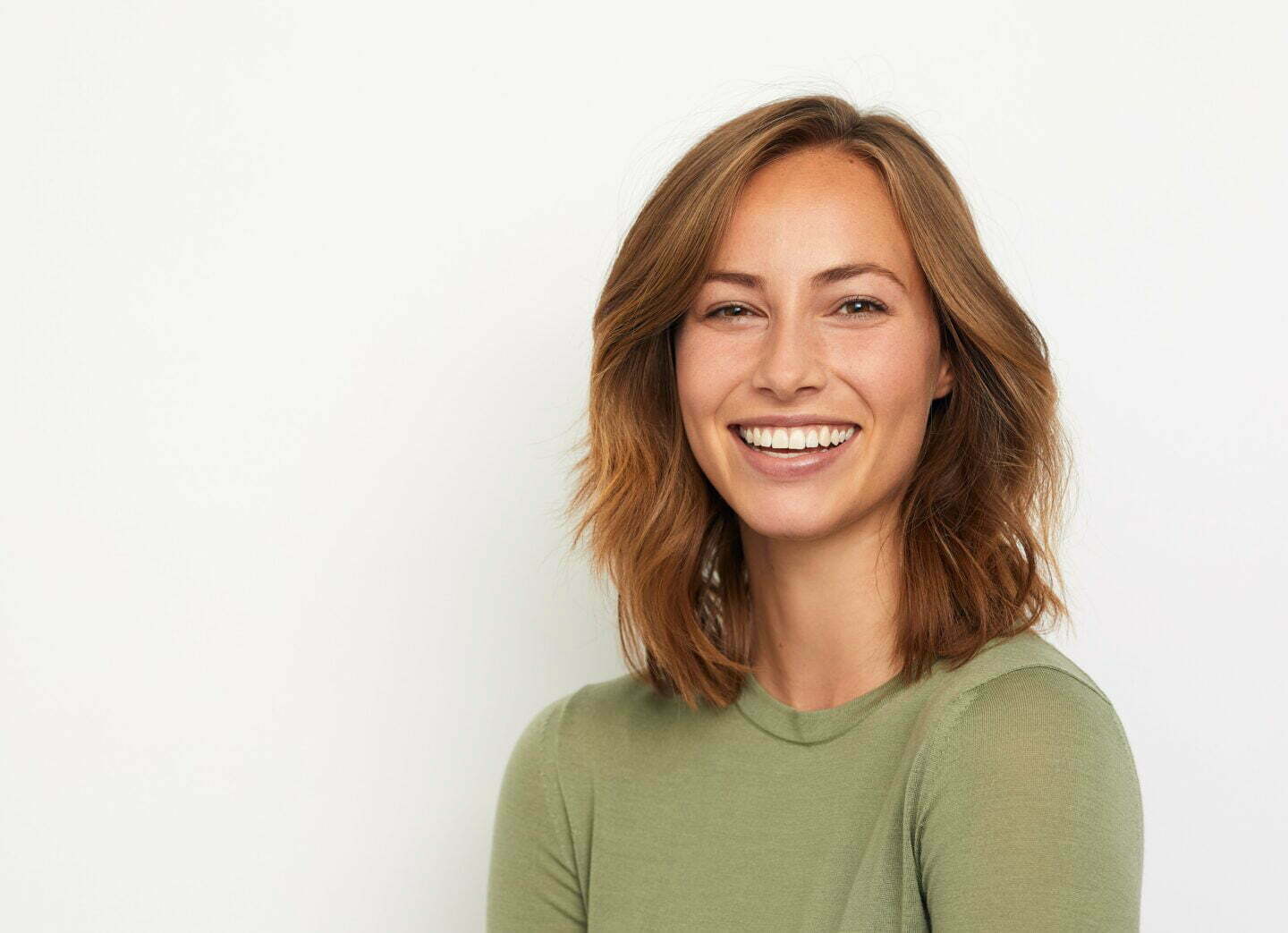 Smiling lady in green