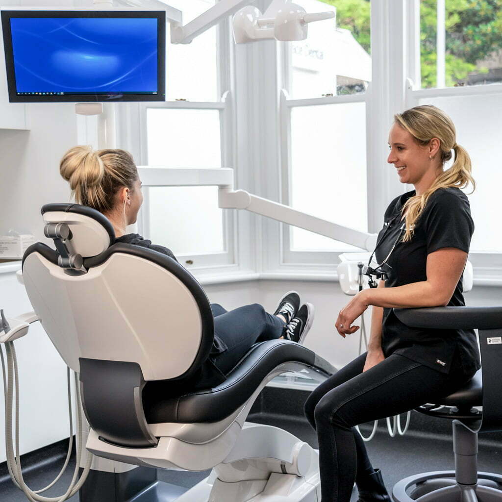 Dr Laura in treatment room with patient