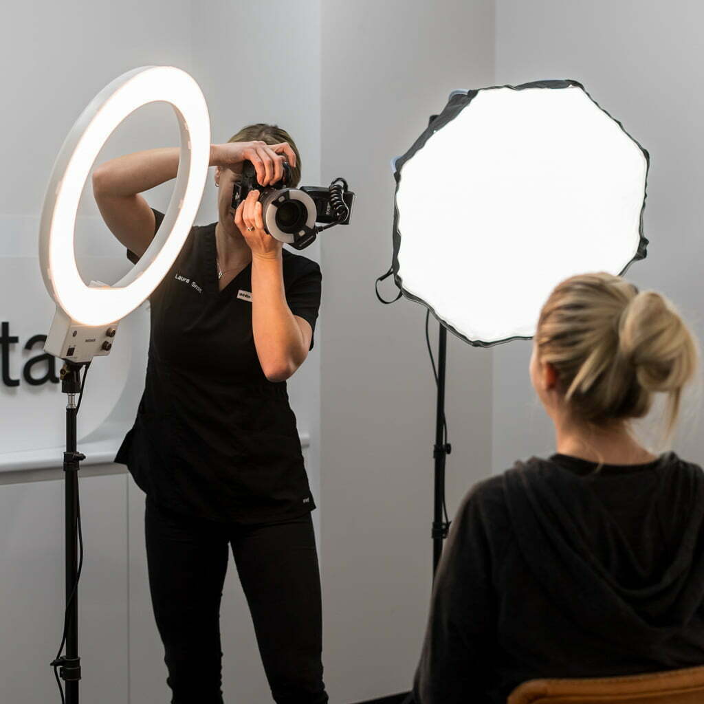 Laura photographing patient