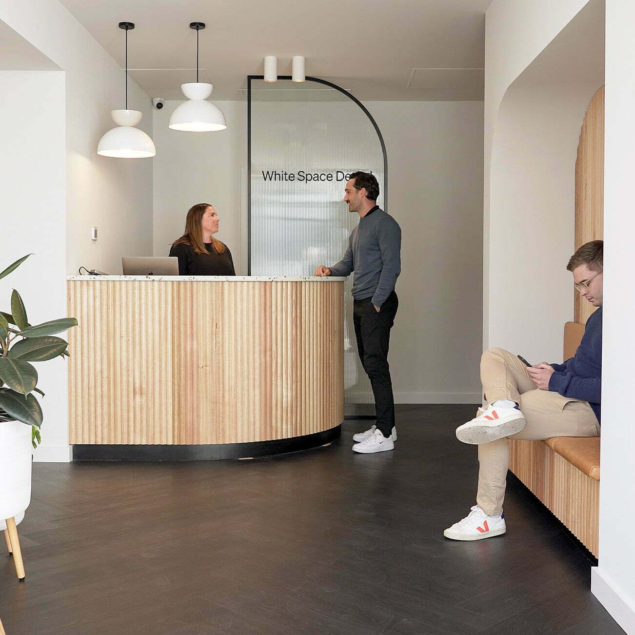 White Space Dental reception area with patients